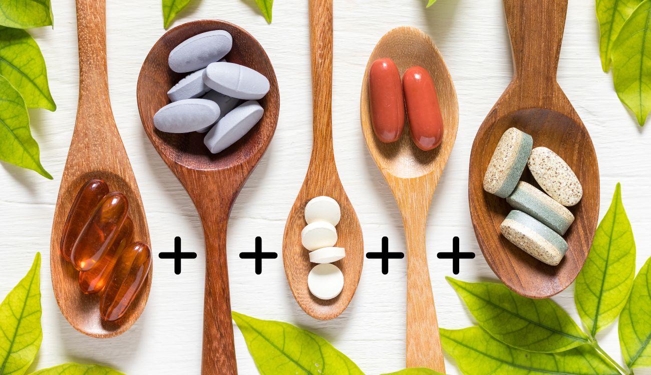 Various vitamins and supplements placed in wooden spoons