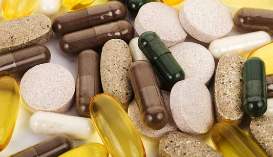 Various types of supplement pills and capsules.