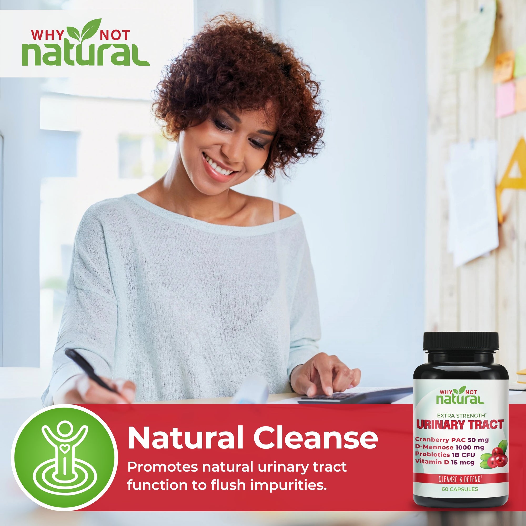 Woman using a computer with 'Why Not Natural' natural cleanse supplement bottle on a desk.