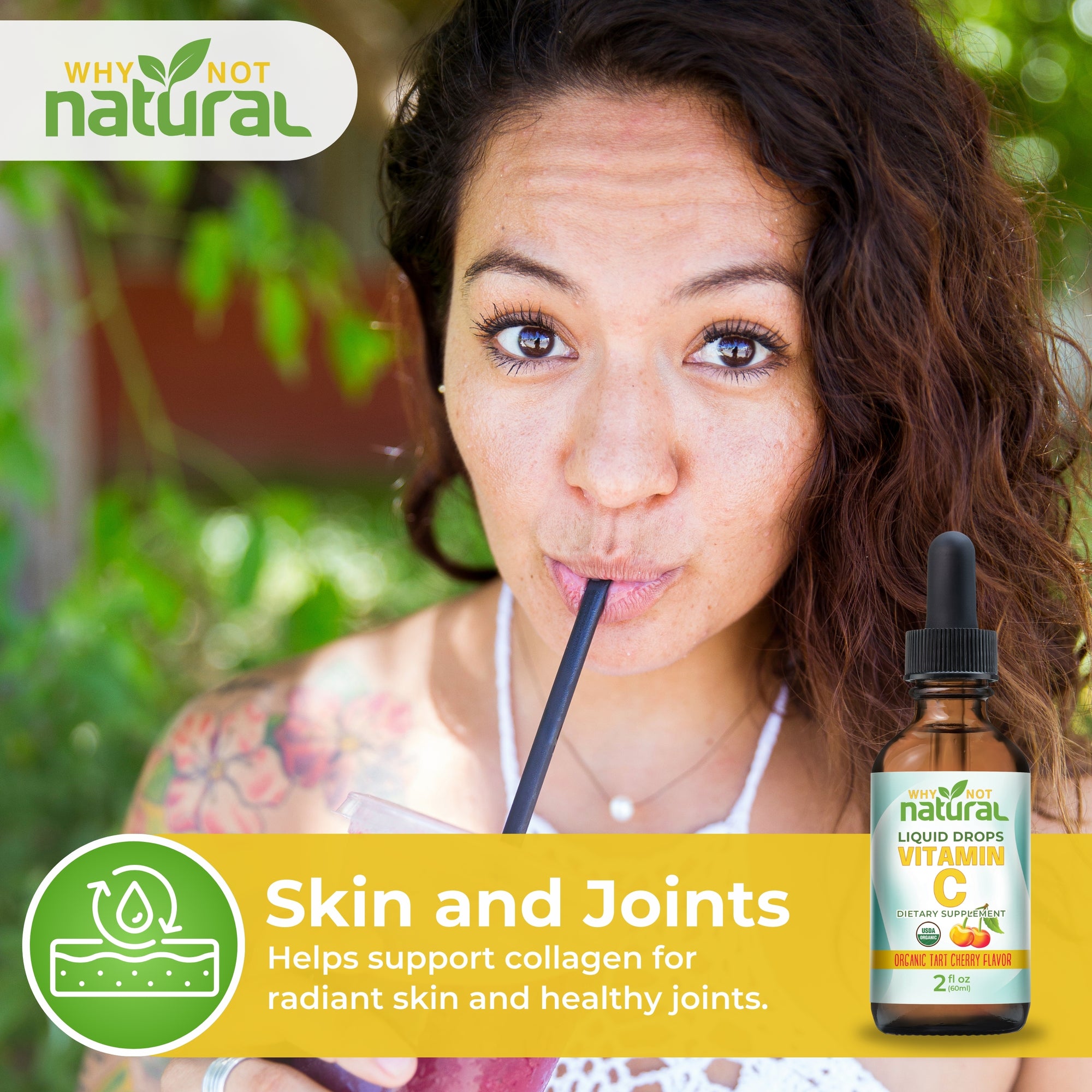 Woman drinking from a straw with a bottle of 'natural' vitamin C supplement in front of her.